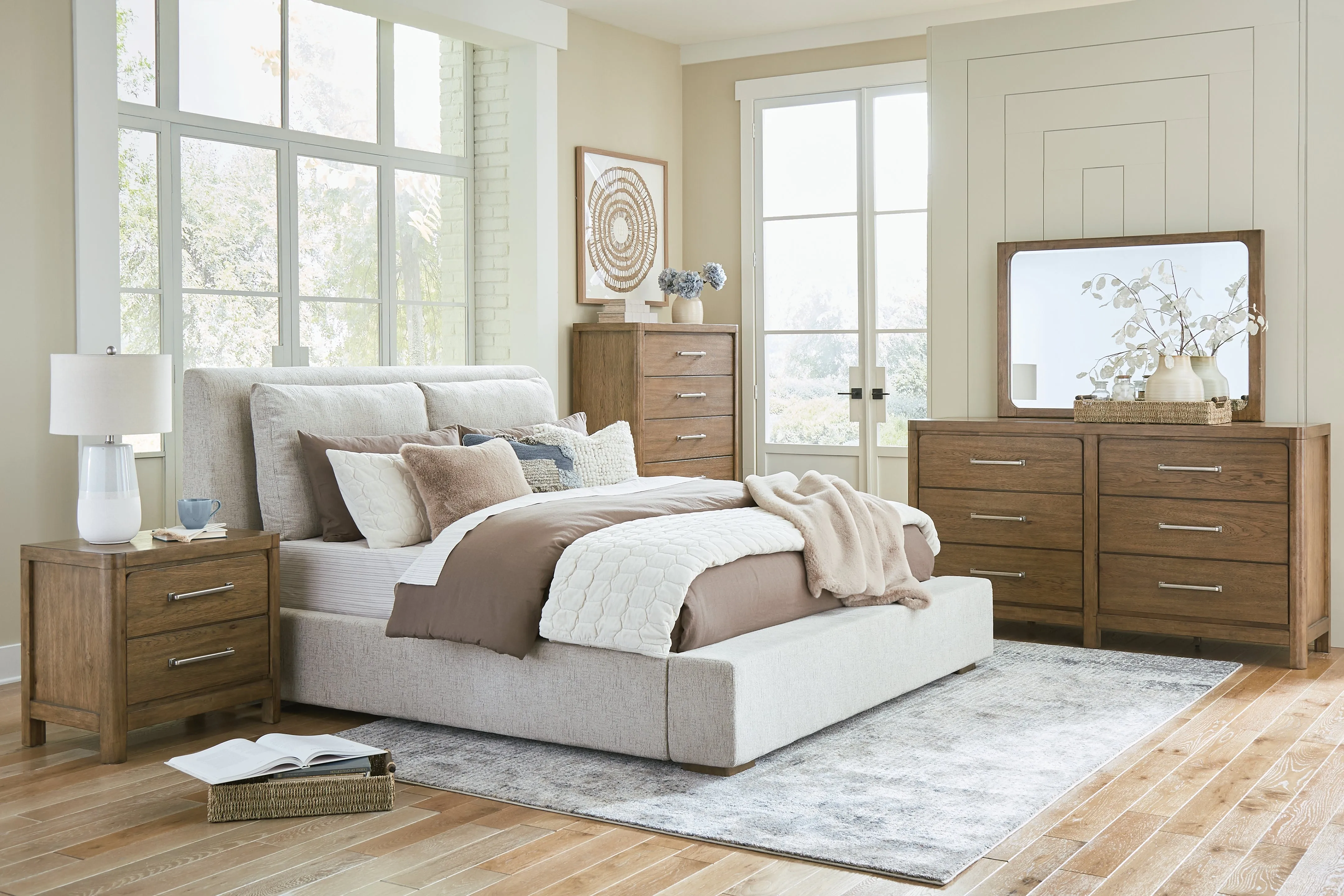 Cabalynn King Upholstered Bed with Mirrored Dresser, Chest and Nightstand in Light Brown