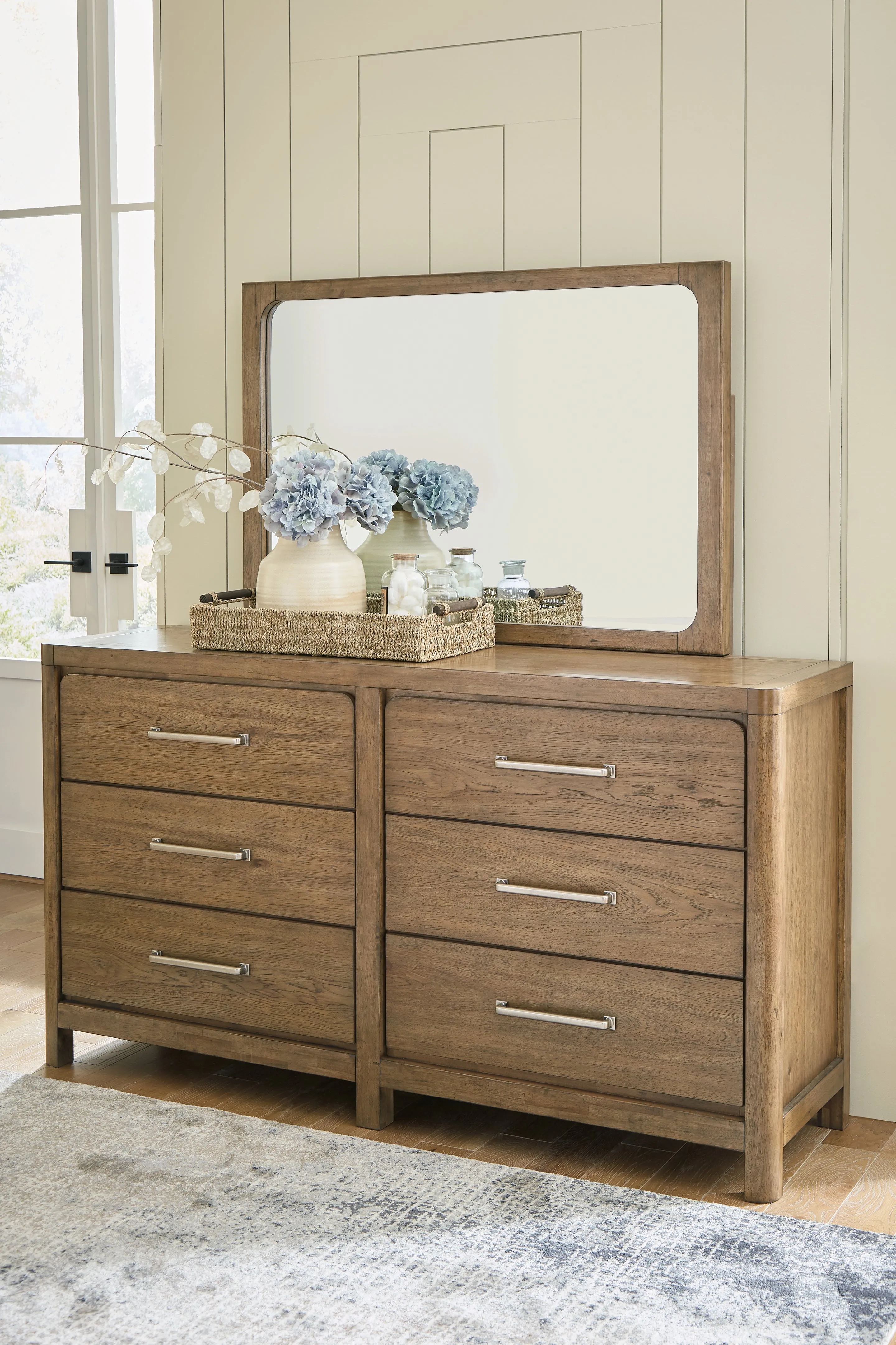 Cabalynn King Upholstered Bed with Mirrored Dresser, Chest and Nightstand in Light Brown