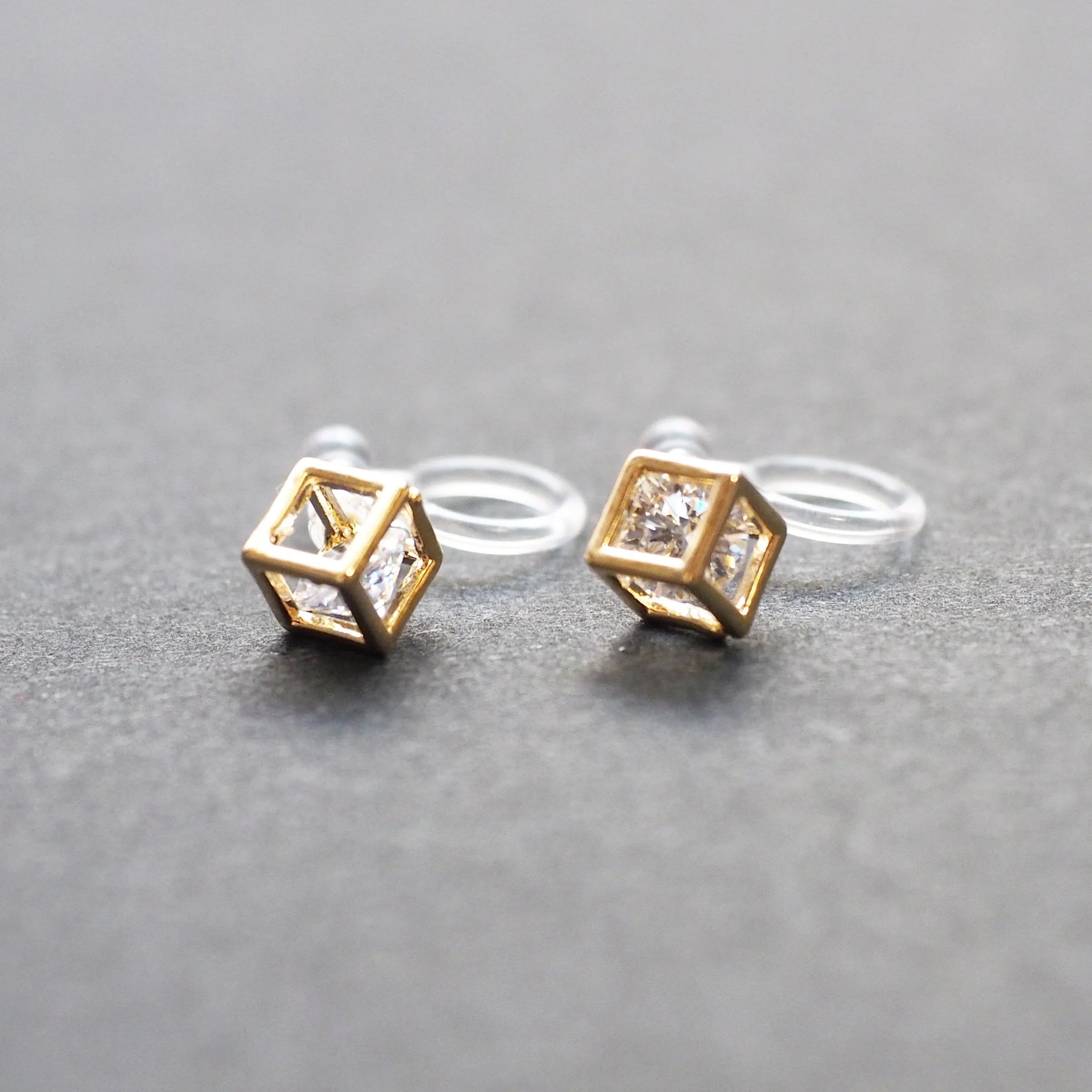 Cubic Zirconia Crystal In Cube Invisible Clip On Stud Earrings ( Gold tone )