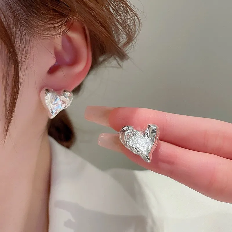 Silver Hammered Heart Coil Clip On Earrings