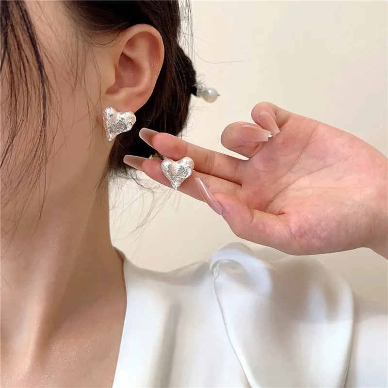 Silver Hammered Heart Coil Clip On Earrings