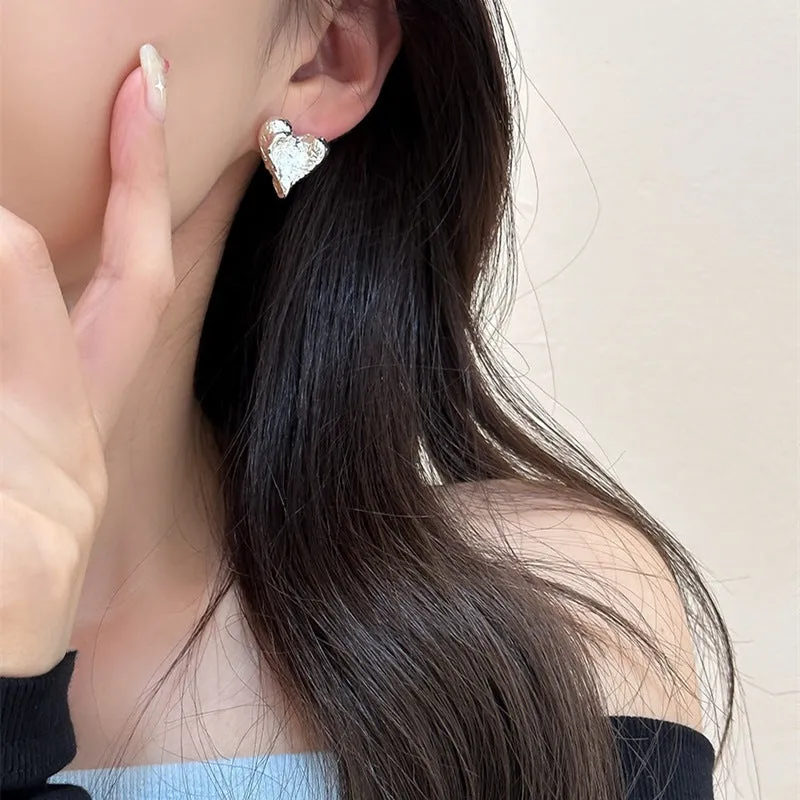 Silver Hammered Heart Coil Clip On Earrings