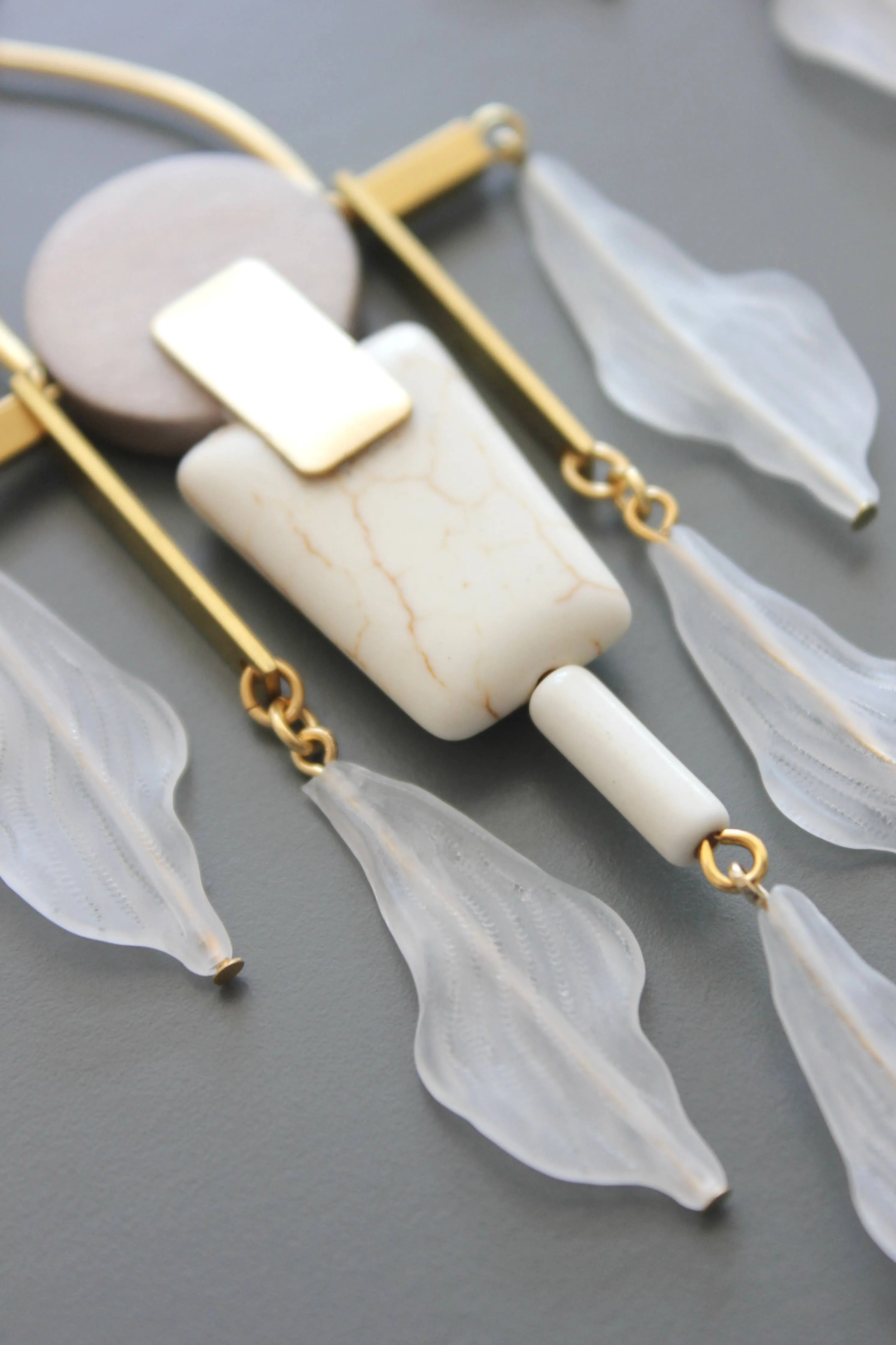 White and gray post earrings